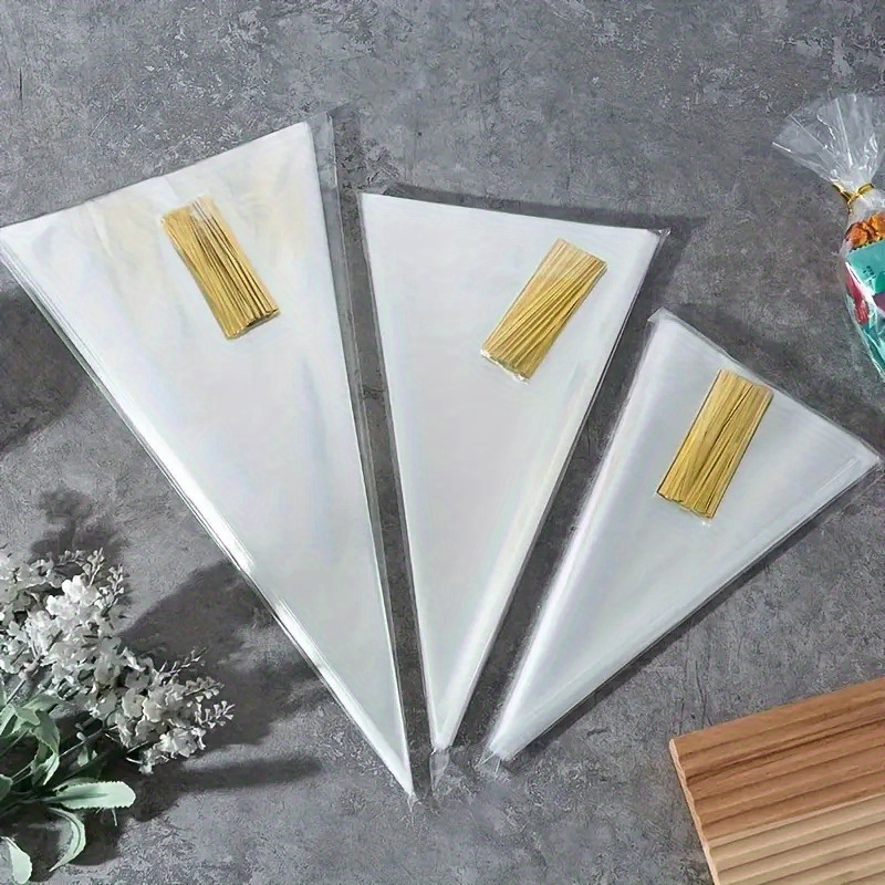100pcs clear plastic candy bags transparent cellophane cones for weddings birthdays party favors durable sweet treat storage packaging with twist tie closure candy bags for candies gift wrapping supplies decorative twist ties glossy  