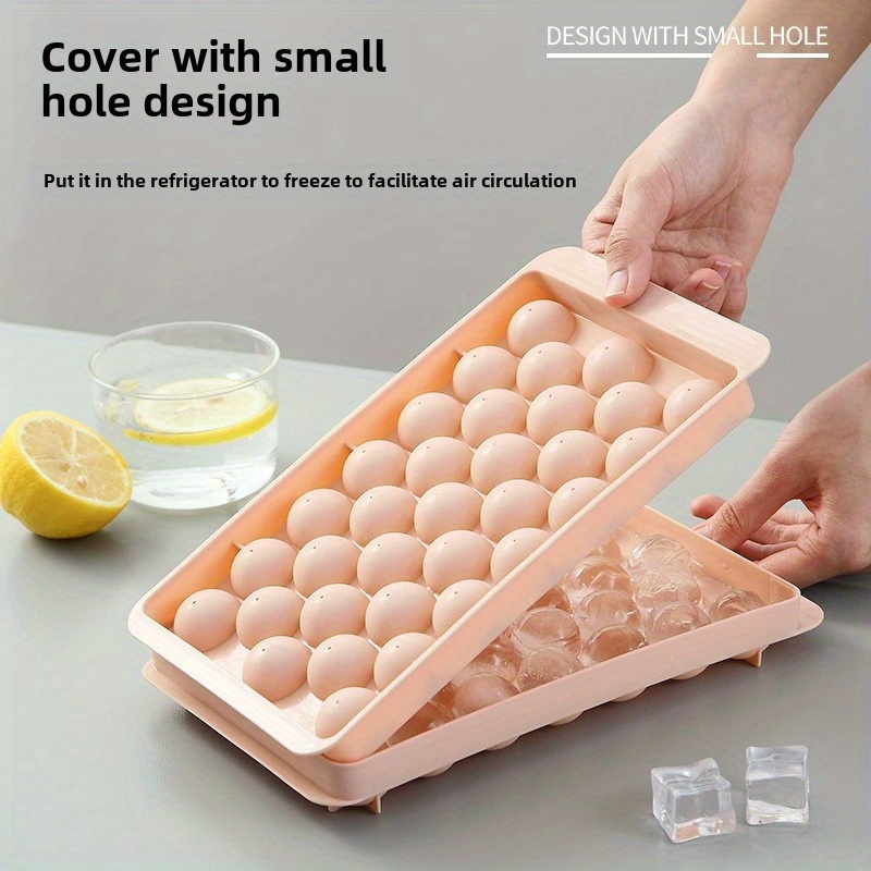 set of 2   molds designed for making ice hockey shapes featuring a 33 grid design this innovative   mold   with a lid making it a must have for   preparation and cold beverage accessories   details 1