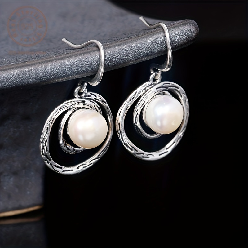 pair of exquisite multi layered swirl pearl earrings traditional carved   three dimensional pattern natural     luxury attractive   suitable for weddings banquets parties   with a   box Product details 4