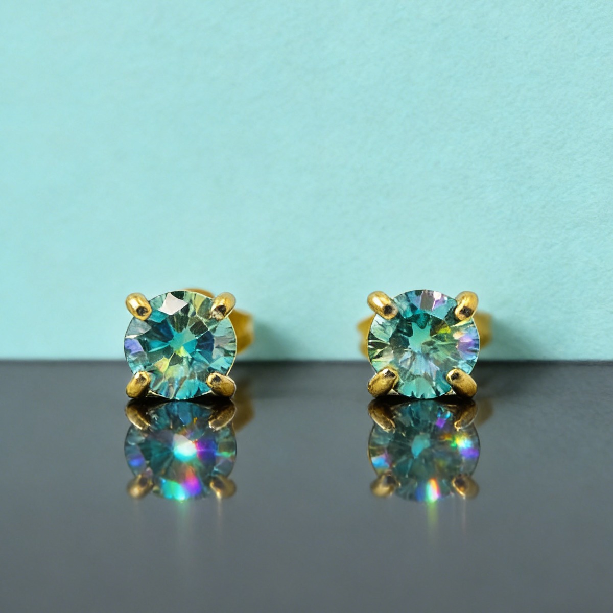 Chic Round Cut Moissanite Four-Prong Golden Stud Earrings