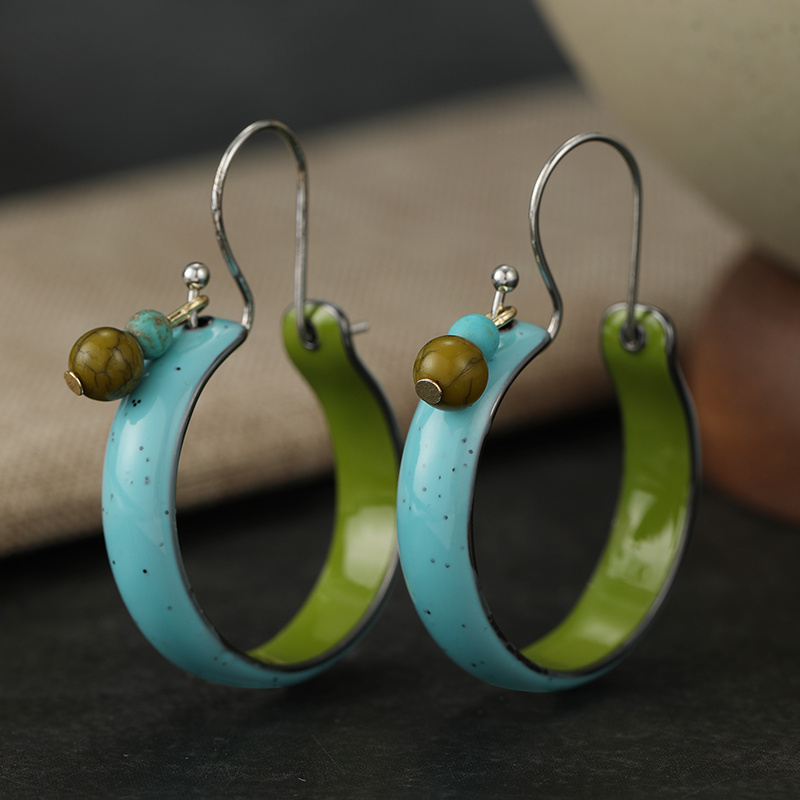 TEMU Boucles d'oreilles circulaires tendance pour femmes, avec des couleurs contrastées et des gouttelettes d'huile associées à un design turquoise