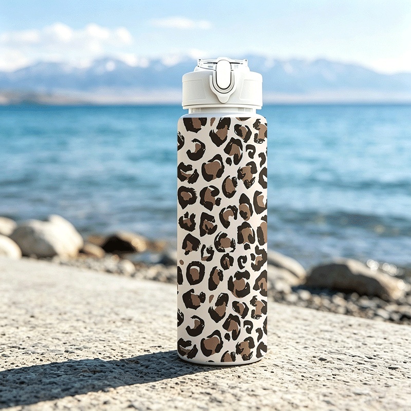 TEMU 1pc 25oz/ 750ml 2d Printed Water Bottle With Lid And Straw Travel Drinking Cup Classic Leopard Print Pattern With Dark Brown On Beige Base.