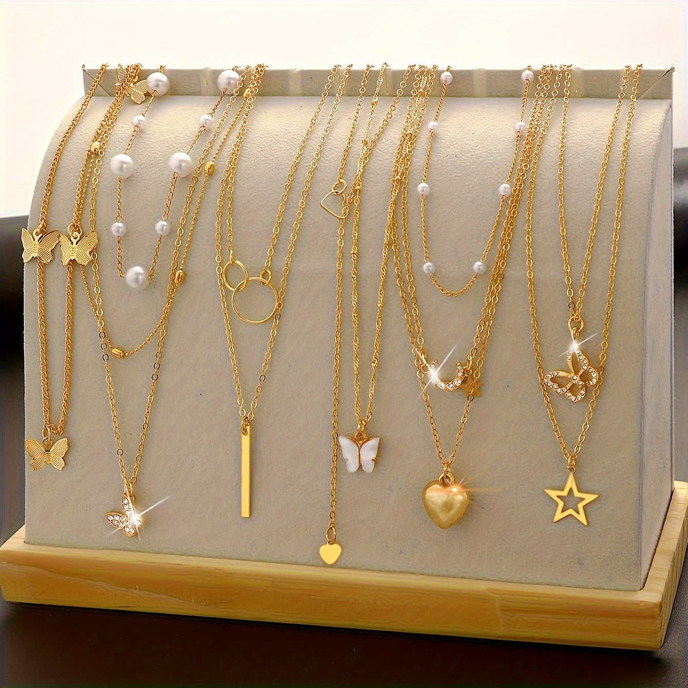 E-shop 11-teiliges Damen Halsketten Set Goldene Perle Strass Herz Schmetterling Stern Anhänger Halskette Damen Multi Schicht Choker Mode Elegant