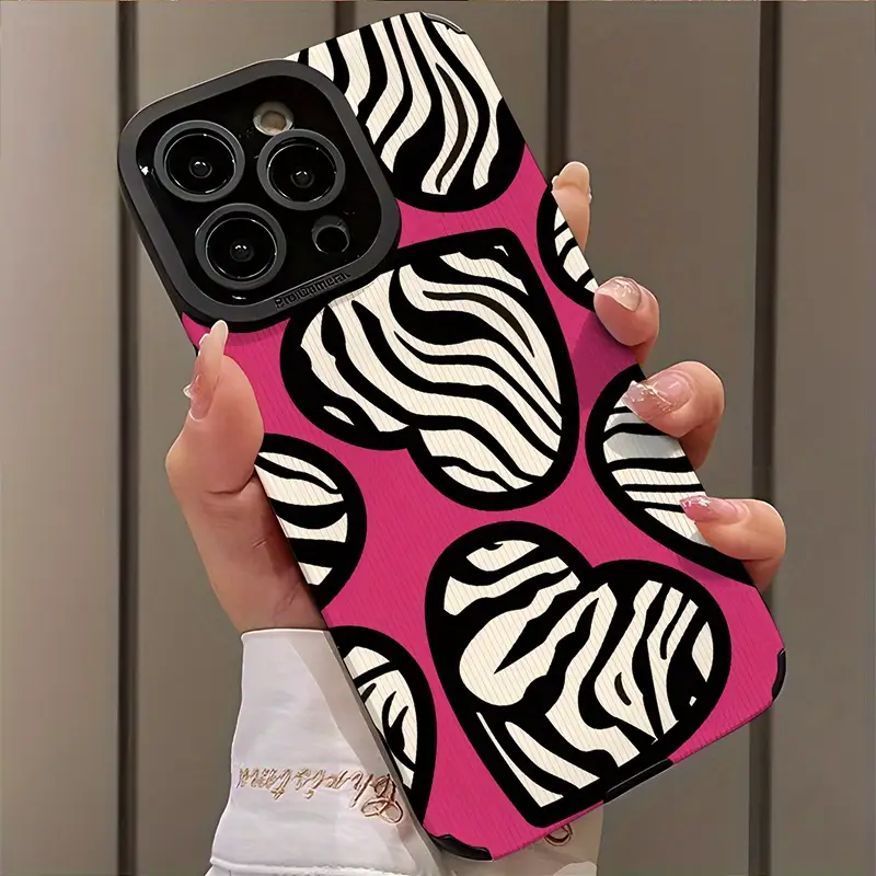 Foto de Funda con diseño de patrón de corazón rayado.