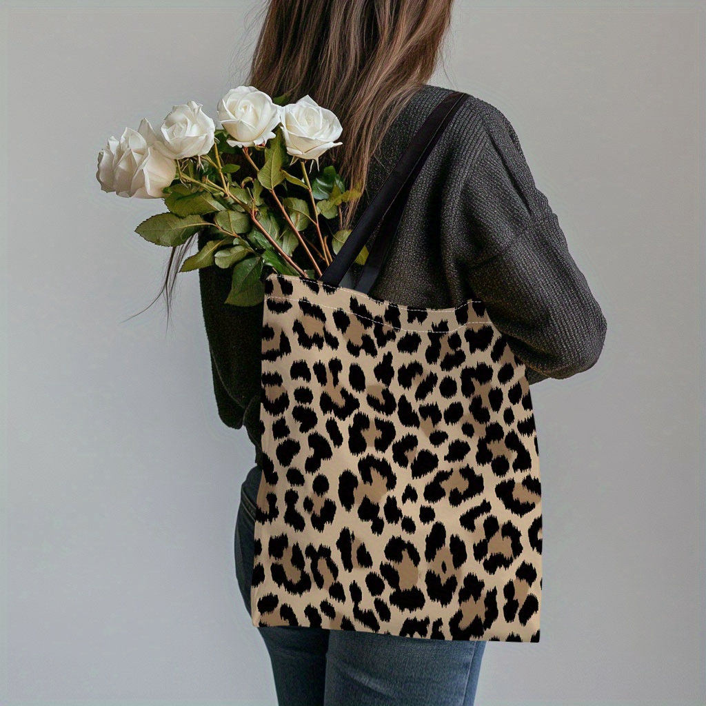 A Tote Bag Featuring A Leopard Print In A Flat 2d Design, Perfect For Commuting And Shopping, And Makes A Thoughtful Gift For