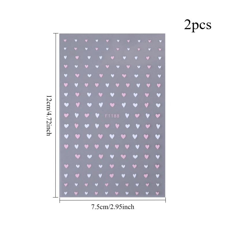 Image of Set Of And White Heart-shaped Nail Stickers Featuring Small Heart Designs, Perfect For A Touch To Your Manicure For Valentine's Day, Weddings, Or French Nails