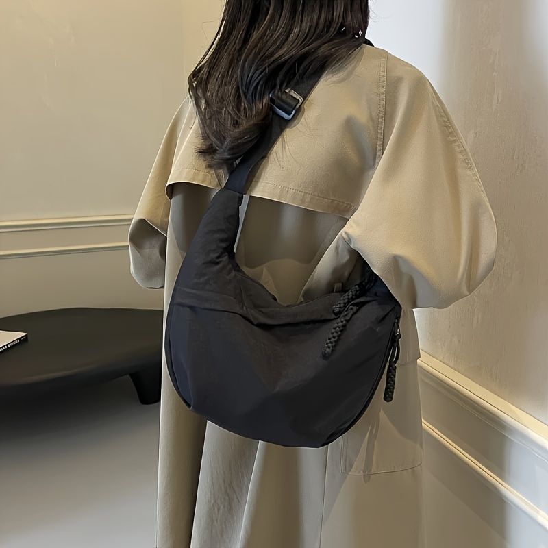 large capacity lightweight nylon crossbody bag with adjustable shoulder strap and multi zipper compartment design suitable for daily commuting and shopping use   in 6 colors