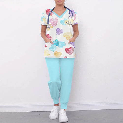 heart balloon style womens summer uniform set with colorful heart balloon print in red blue yellow and purple v neck short sleeve blue jogger pants with a stethoscope suitable for ob gyn nurses