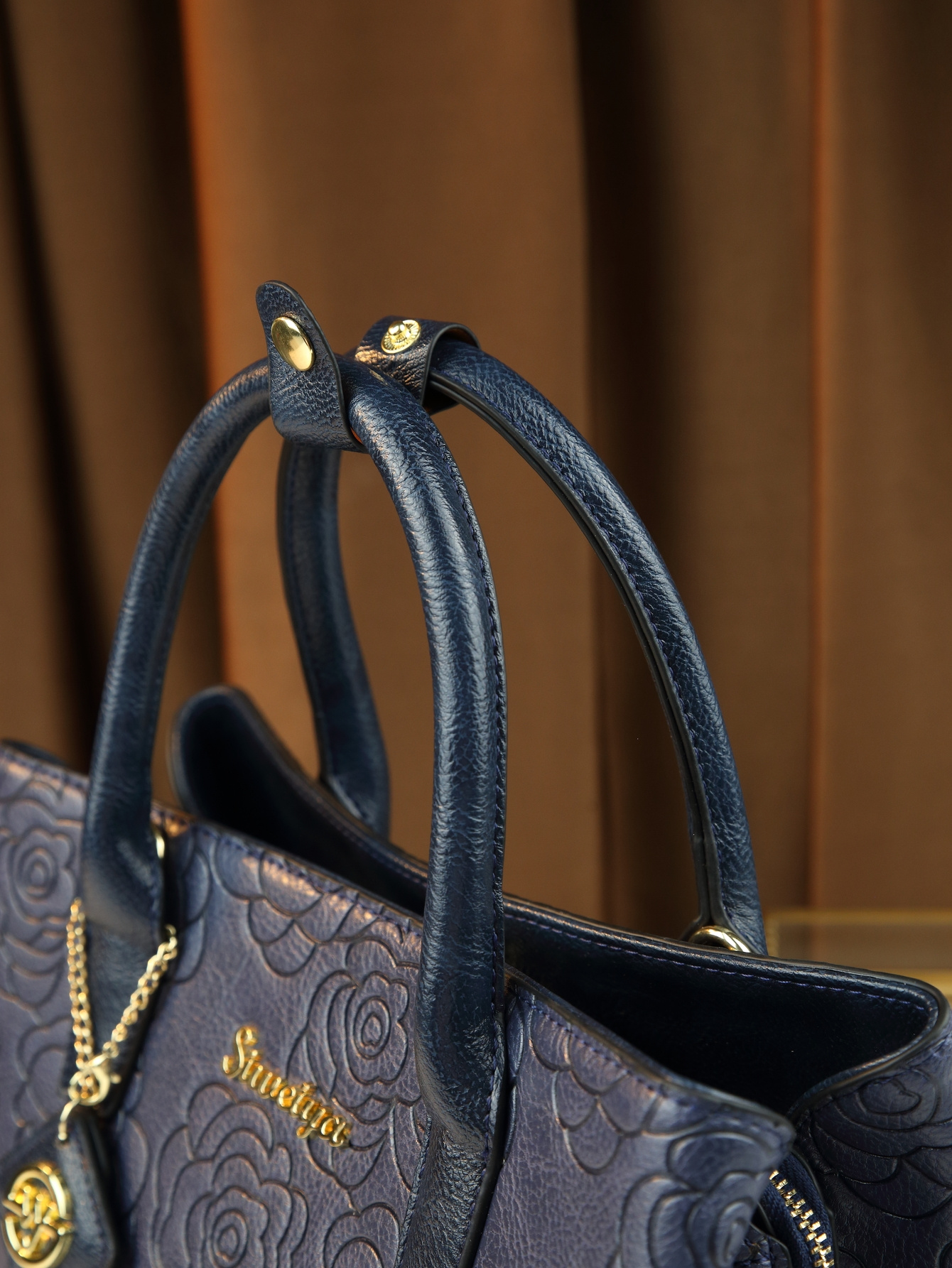 Thought Yaa Handbag held by hand