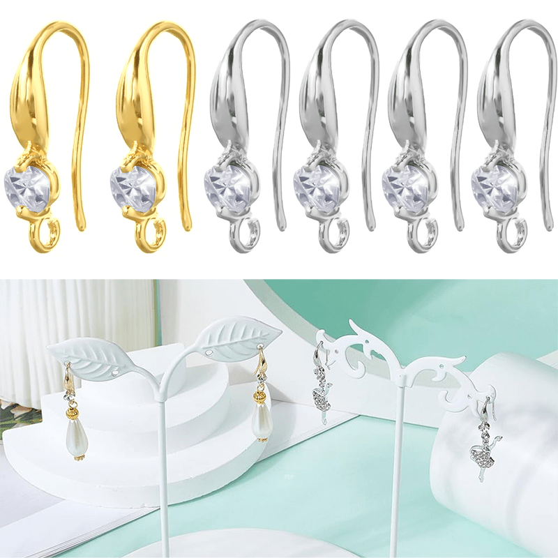 TEMU Una colección de ganchos para pendientes elaborados con baño de oro de 18K, que exhiben alambres para de circonita cúbica con un bucle abierto,