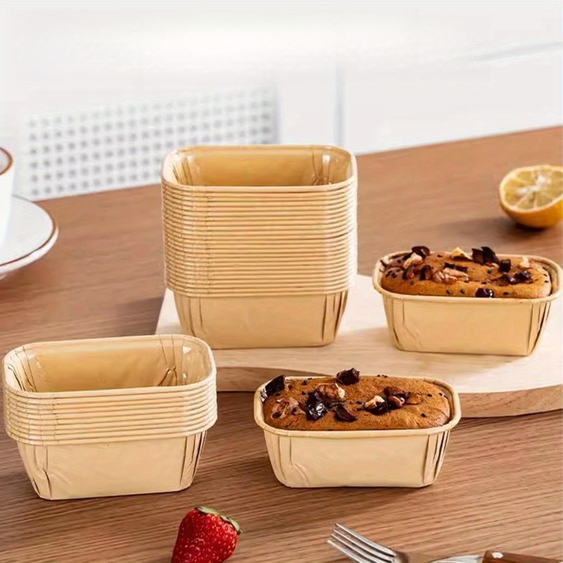 E-shop Set mit 52 ölbeständigen Backförmchen, rechteckige Mini-Größe mit geriffeltem Rand zur Auslaufsicherung, stapelbar für gleichmäßiges Backen.
