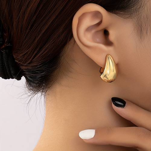 a pair of elegant c shaped stud earrings ladies incorporating comfortable and in