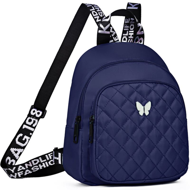 Mochila acolchada unisex, bolso de hombro para viaje y casual, con correas ajustables, múltiples compartimentos y logo de mariposa, disponible en 4 colores (negro, rojo, morado, azul), mochila para viajar con cierre de cremallera seguro - Imagen 5