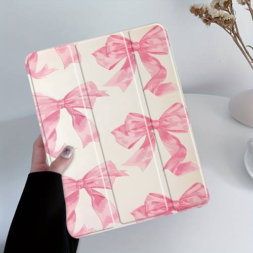 tablet case featuring a pink satin bow design complete with a pencil holder and an auto wake sleep protective cover suitable for for ipad models aesthetic gift option for women and teenage girls