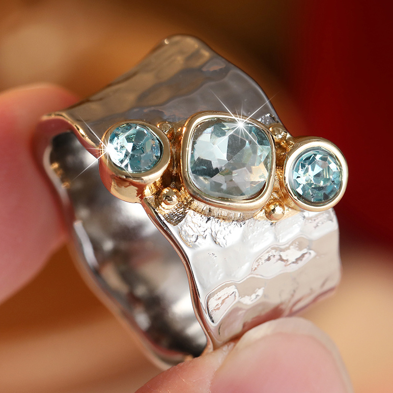 Women's Irregular Hammer Pattern Wide Face Ring with Blue Zirconia