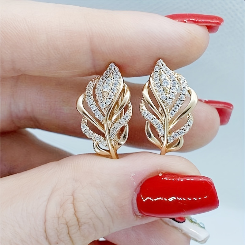 1 pair of elegant minimalist copper leaf earrings with sparkling synthetic zirconia, fashionable romantic wedding women s clip-on jewelry, april birthstone, suitable for daily wear 0