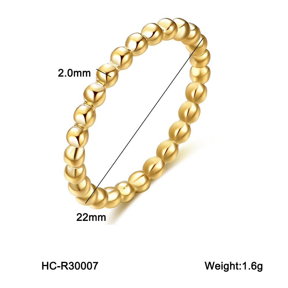 E-shop Ein goldener Titanstahlring mit einem einzigartigen und vielseitigen Design, im leichten Luxus-Vintage-Stil, zum Tragen an der Zeigefinger ohne