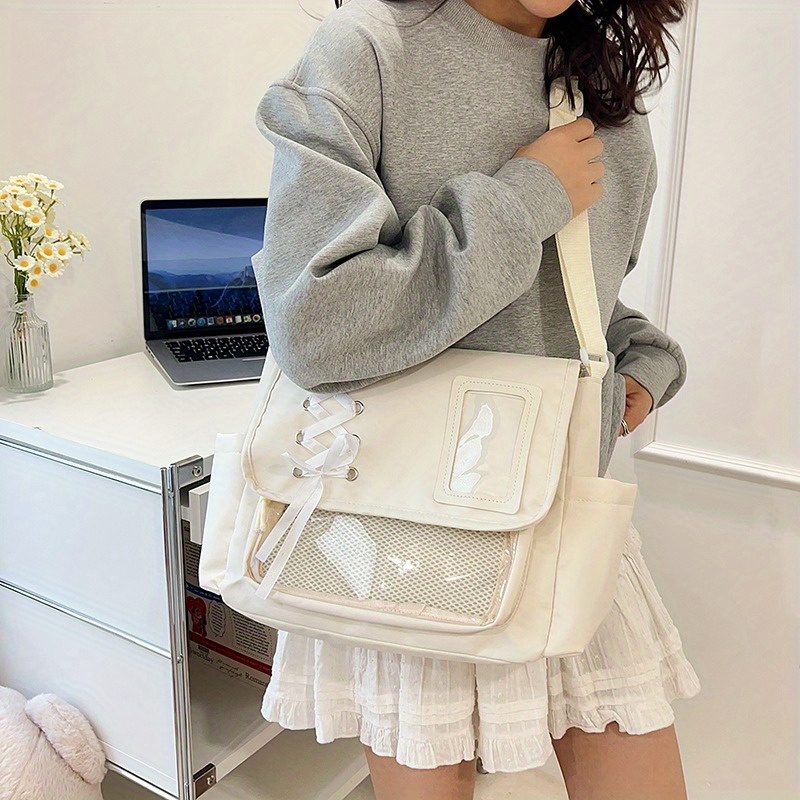stylische canvas schultertasche mit reißverschluss, entworfen im japanischen schulstil,   für damen. sie bietet viel stauraum für den   und kann als trendige umhängetasche oder rucksack verwendet werden.