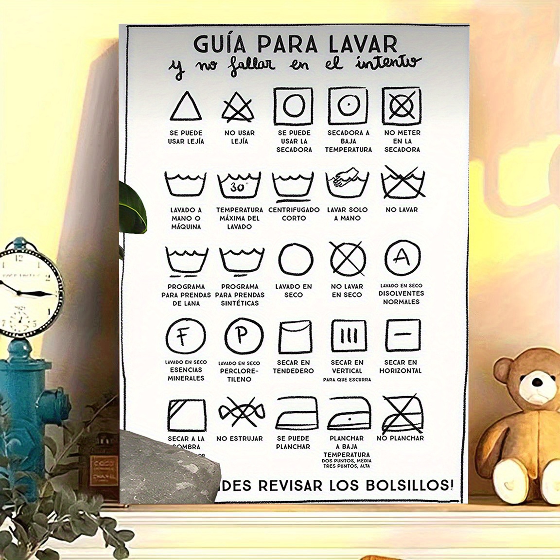 TEMU 2D , 2D , con un guía de símbolos de lavandería española vintage en un diseño sin y negro, ideal para decorar lavanderías y como recordatorio
