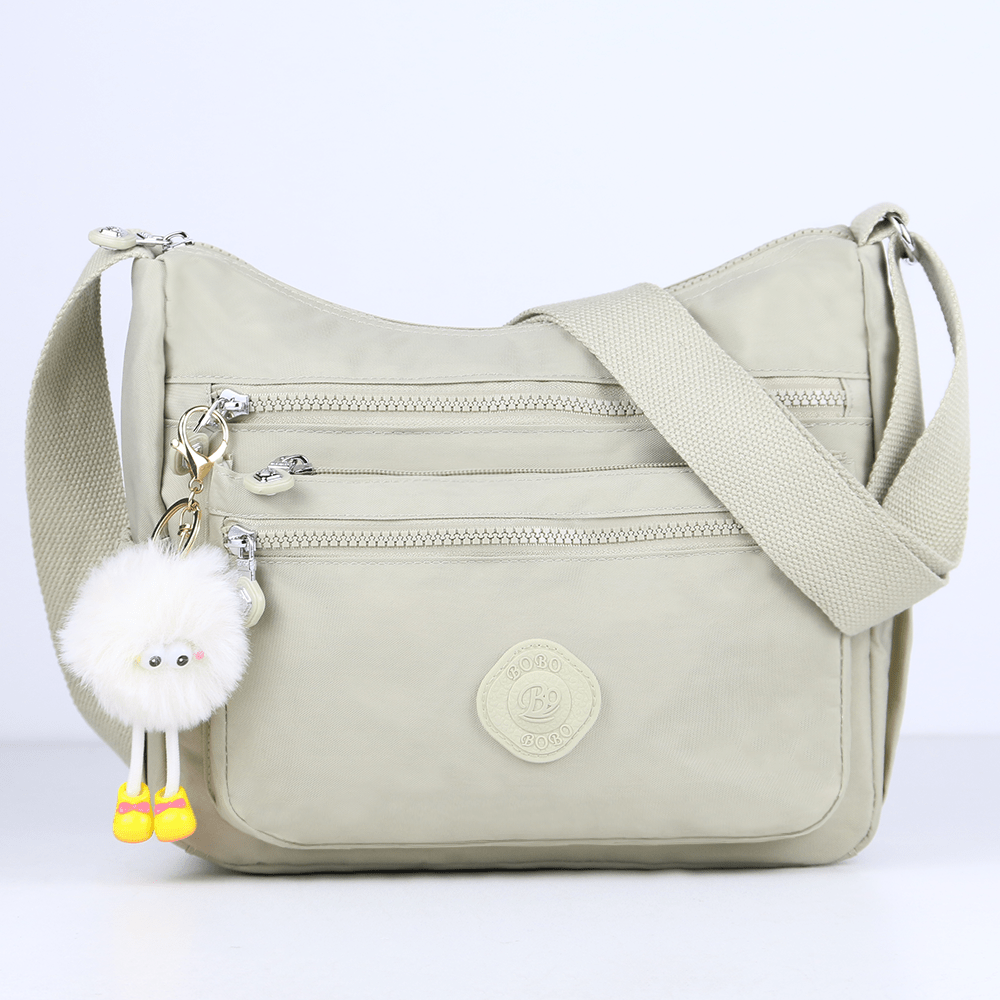 stylish lightweight multi pocket unisex crossbody bag with pendant elegant durable womens shoulder bag sturdy anti theft womens crossbody bag durable fabric multiple compartments adjustable straps perfect for travel daily use commuting Product details 16