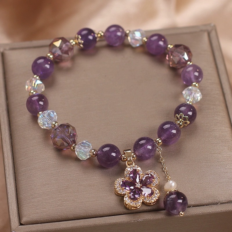 A Women's designed natural amethyst bracelet, featuring irregular crystals and Synthetic Zirconia, with a light luxury minimalist style, suitable for year-round wear.