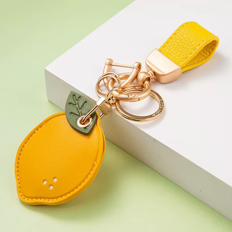 Image of 1pc Faux Leather Hidden Airtag Holder, Cute Protective Airtag Case Additions With Wristlet Strap Lanyard Key Chain