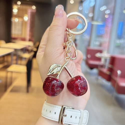 womens elegant cherry keychain realistic with glossy light texture stem leaf charm everyday formal bag accessory durable alloy fruit pendant for women birthday anniversary gift idea elegant purse charm cute c