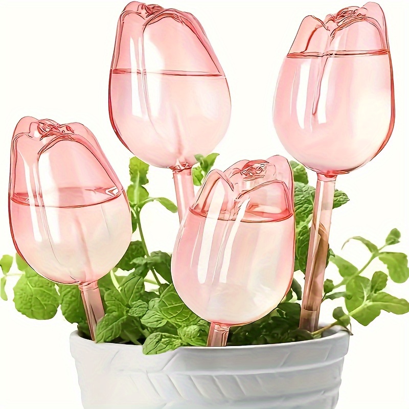   pink tulip irrigation ball with narrow opening design extended drip time suitable for indoor and outdoor potted plants hanging baskets gardening tools and lawn care additions plant irrigation ball