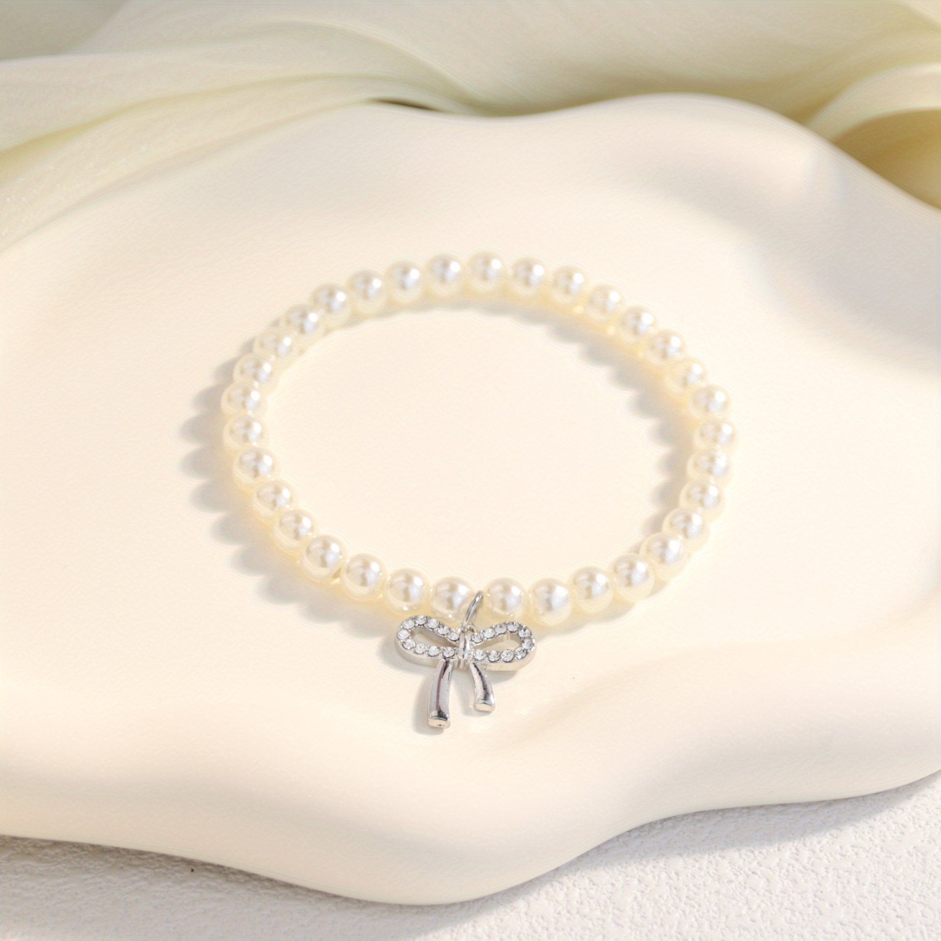 A Pendant Bracelet Bow Bracelet Trinkets: retailer-supplied image