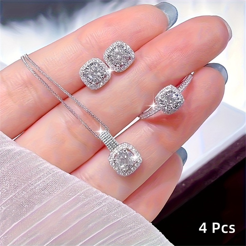 4pcs sparkling water glass jewelry set the combination of necklace pendant ring and earring delicately cut to showcase   radiance fashionable and versatile   handles   occasions and is an     to enhance charm