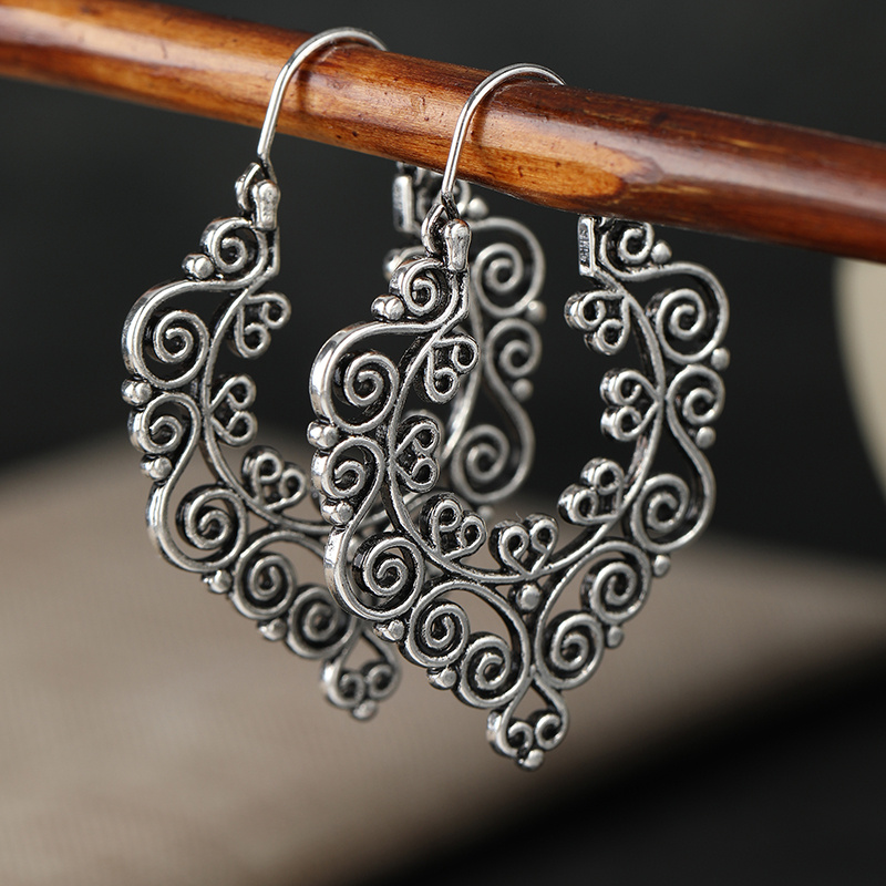 Women's Retro Hollow Scroll-patterned Large Pendant Teardrop Earrings