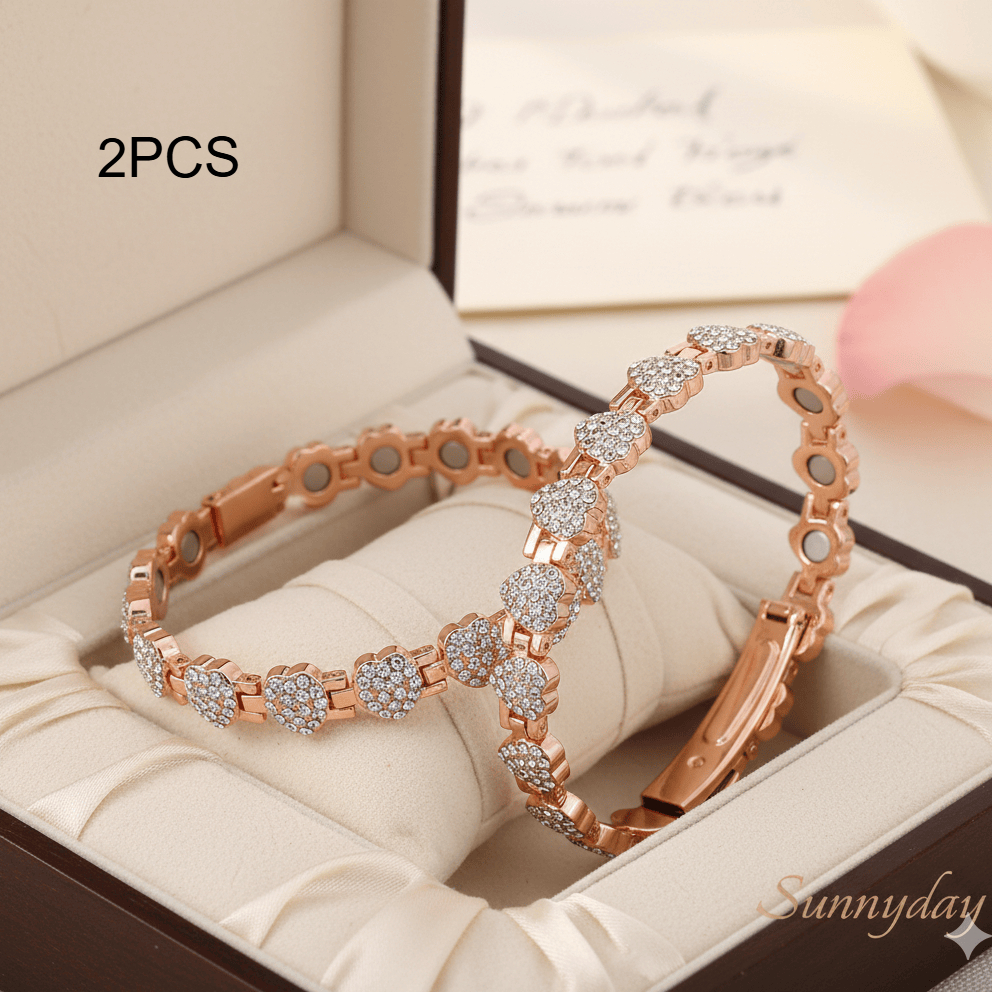 E-shop Set mit 2, elegantes magnetisches Kupferarmband für Damen mit Liebeskette in Roségolden-Kristall. Ein langlebiges und stilvolles Armband mit