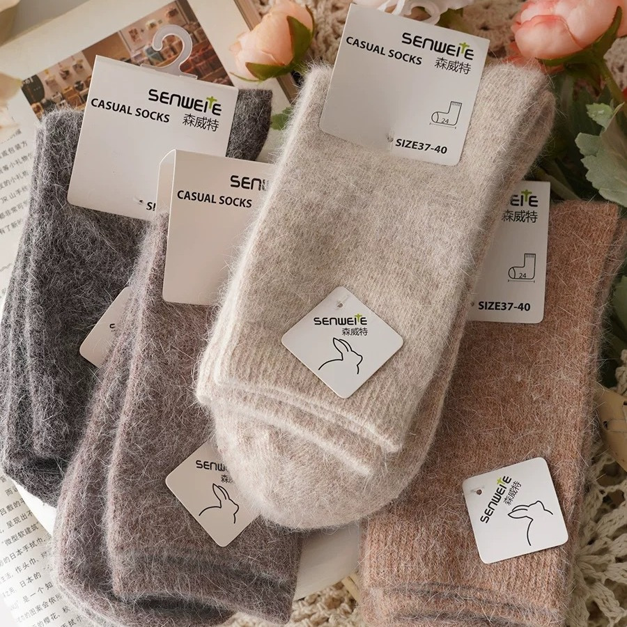 

A Pair Of Soft Mid-calf Socks For Autumn And Winter In Gentle Colors.