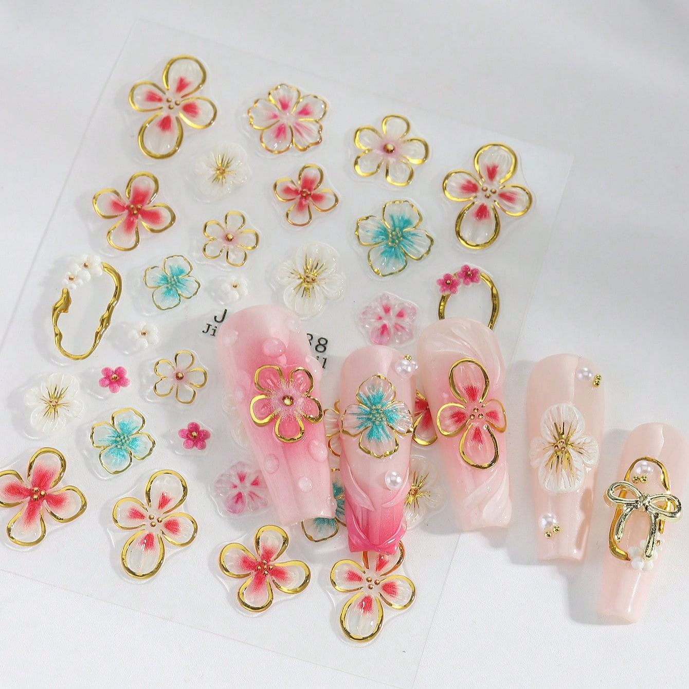 1 Sheet Of 5d Bronzing Floral Nail Stickers Featuring , Y2k Decals, Macaroon Nail Sliders, And Decorative Charms For Artistic