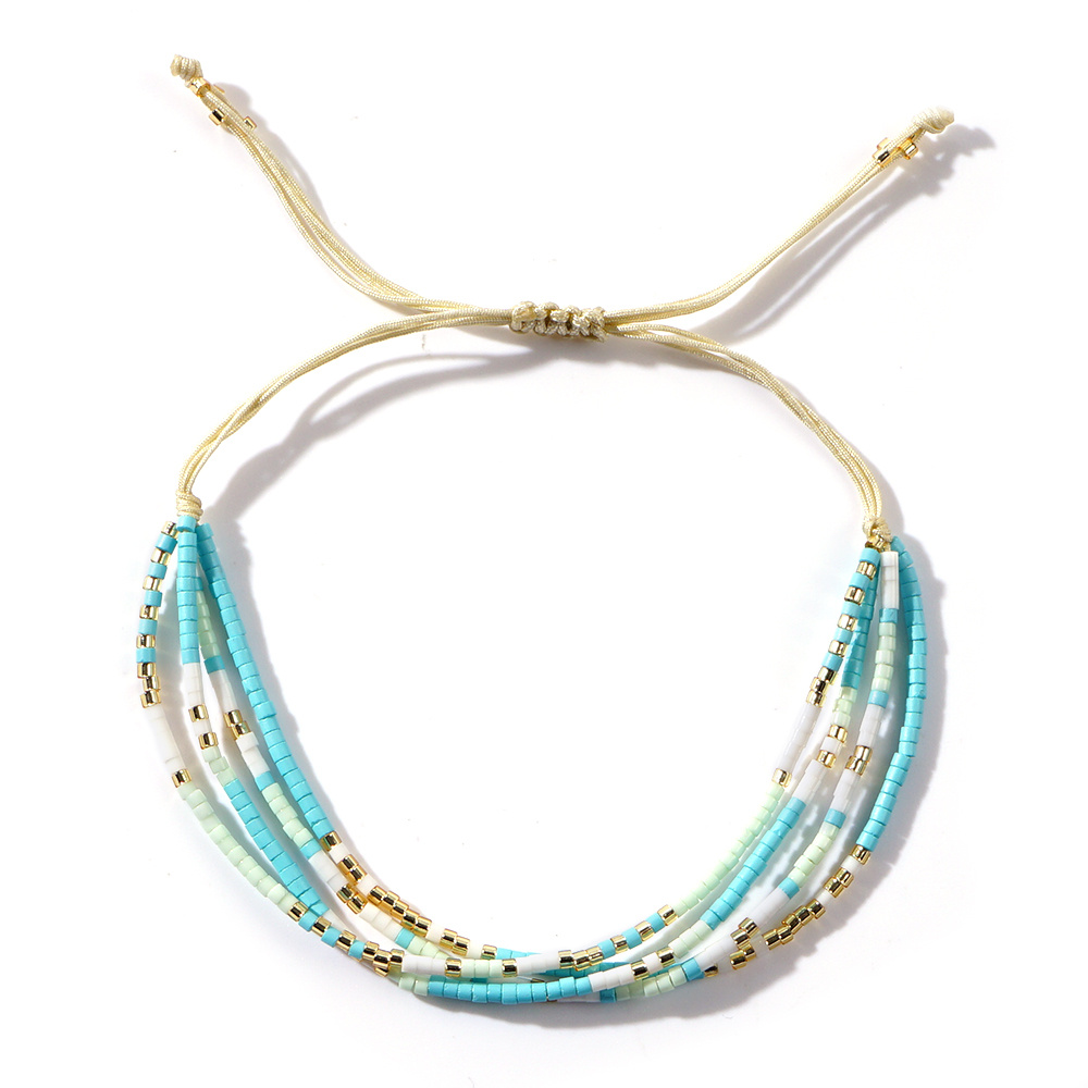 TEMU Un bracelet enveloppant tendance pour femme, style bohème, avec quatre couches de perles de verre réglables, parfait pour être empilé , pour