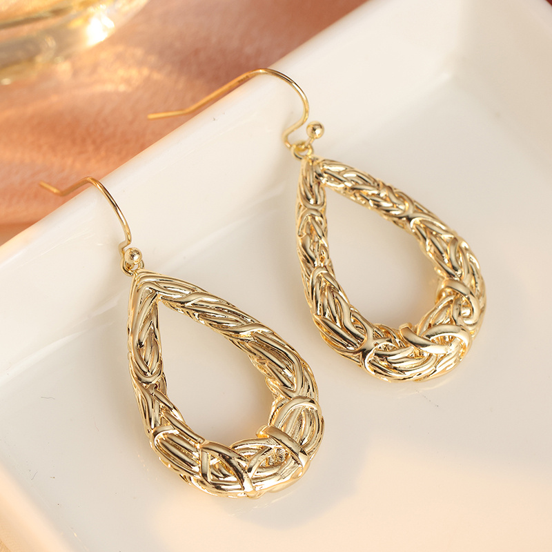Women's Retro Bohemian Hollow Woven Twisted Earrings
