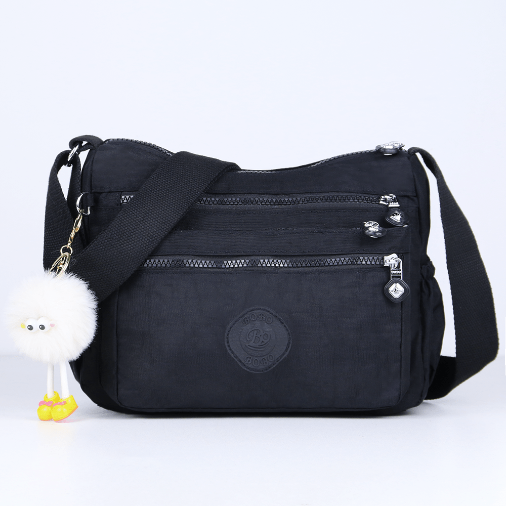 stylish lightweight multi pocket unisex crossbody bag with pendant elegant durable womens shoulder bag sturdy anti theft womens crossbody bag durable fabric multiple compartments adjustable straps perfect for travel daily use commuting Product details 15