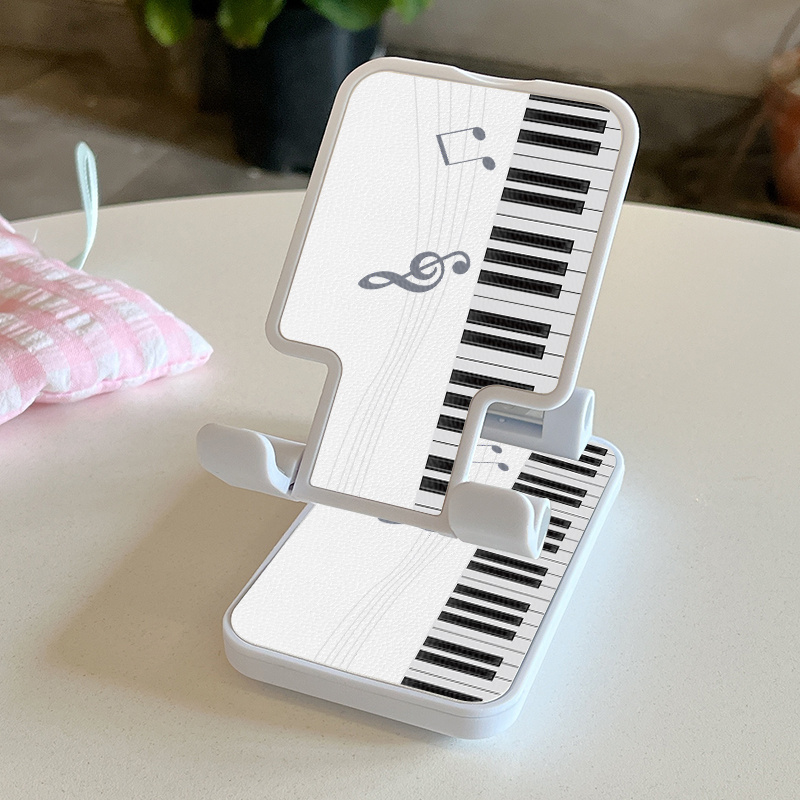 E-shop 2025 Neue Luxus Mode Kreativität Verstellbarer Desktop Piano Tasten Muster Handyhalter - Faltbar, Höhe & Winkel Verstellbar, Nicht-ABS Material,