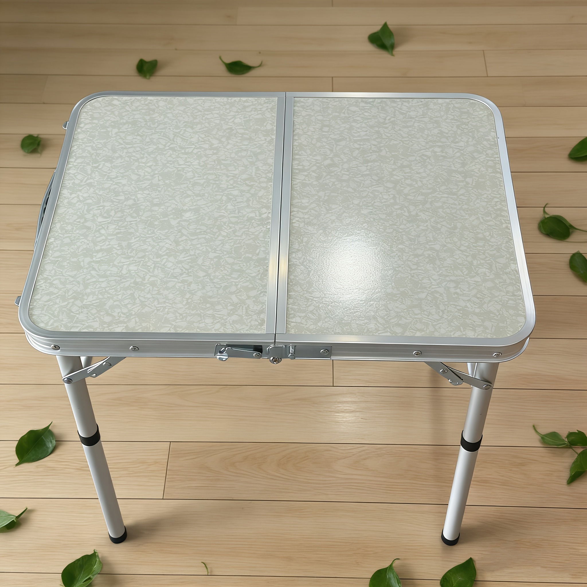   Aluminum Alloy Outdoor Folding Table, a Portable Camping and Picnic Barbecue Table Suitable for   Stalls. Ideal for Outdoor Activities Like Camping and Picnics, This Table Combines Practicality and Portability. Its Lightweight
