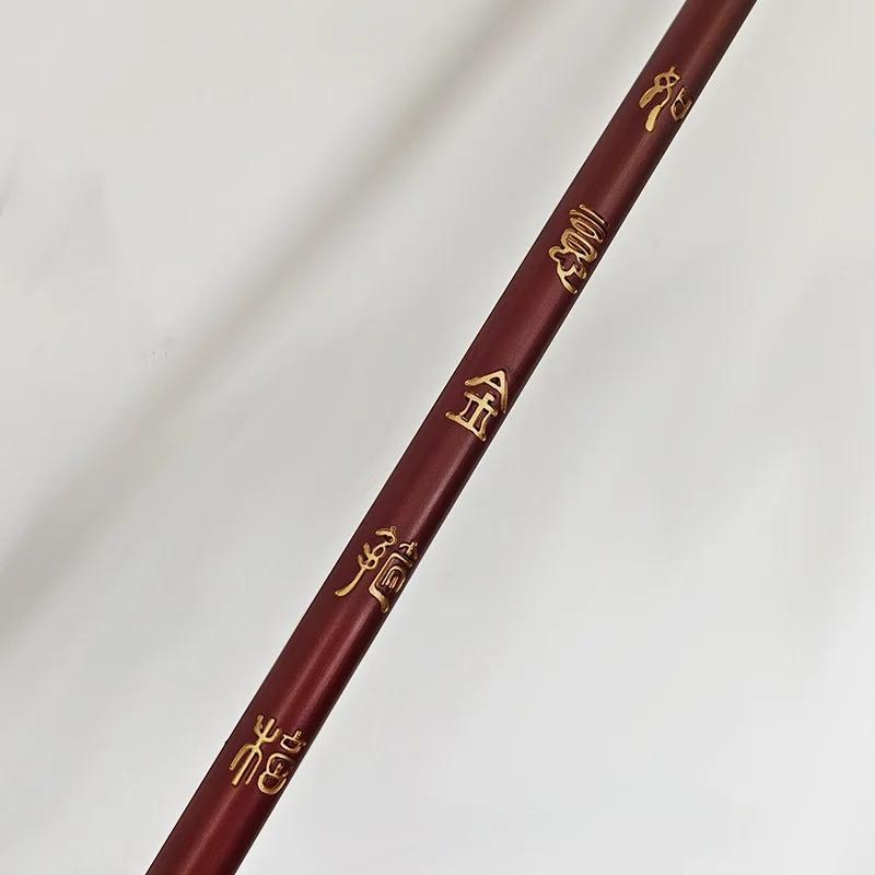 A Sun Wukong Stick with gold symbols on a white background