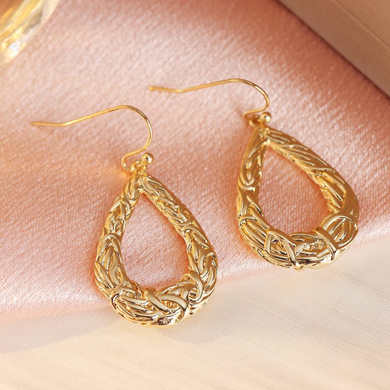 Women's Retro Bohemian Hollow Woven Twisted Earrings