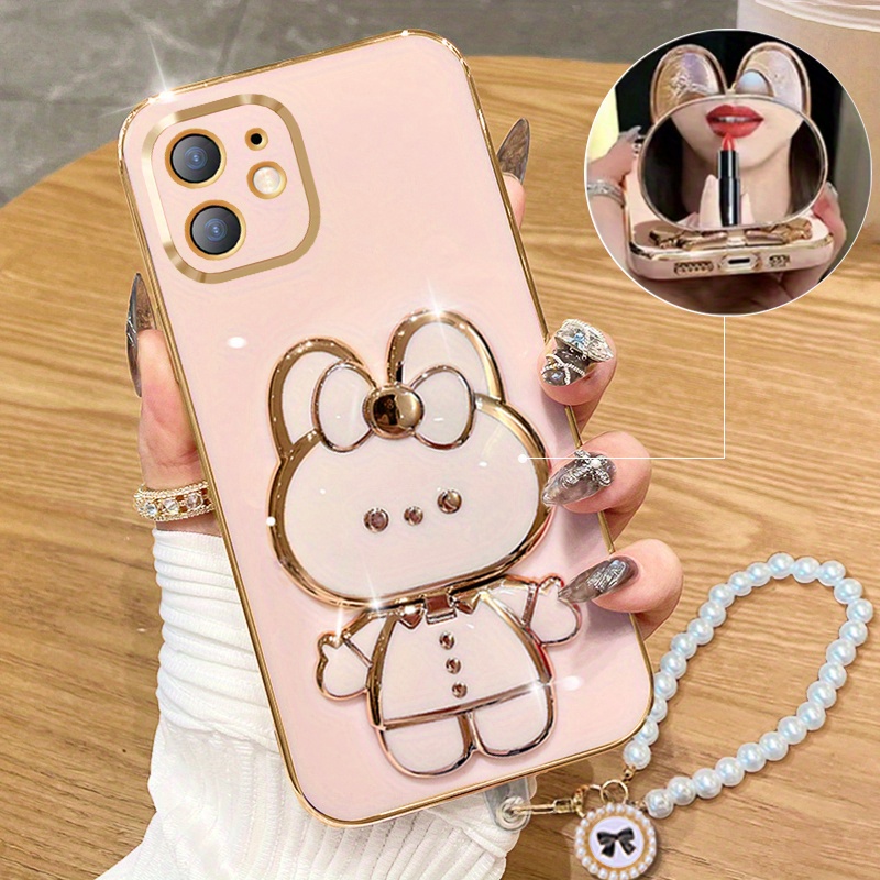 เคสโทรศัพท์: สำหรับ iPhone 11 สายคล้องมุก 1 ชิ้น ที่วางกระจกพับน่ารัก 1 ชิ้น และเคสโทรศัพท์ชุบหรู 1 ชิ้น สำหรับ…: retailer-supplied image