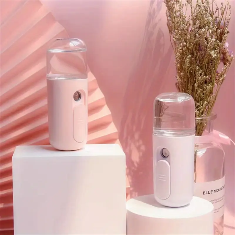 portable mini humidifier with face mist spray rechargeable battery powered usb charging sliding switch design for home outdoor compact lightweight ideal for dry skin allergies humidifier for home office hygiene Product details 0