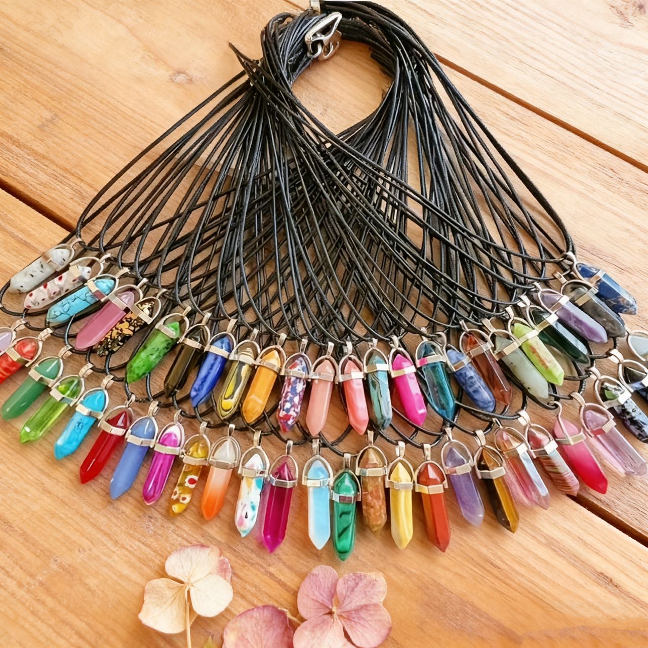 set of 30 chakra pendant necklaces featuring pointed hexagonal clear quartz crystal stones   faux leather chains   holiday gifts for christmas halloween and thanksgiving