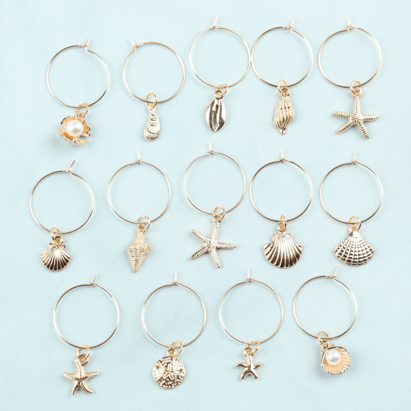 E-shop 14-teiliges Set mit Meeresmotiv-Winnglascharms (Glascharms), Hochwertige Sommerstrandelemente, einschließlich Muscheln, Seesternen usw.,