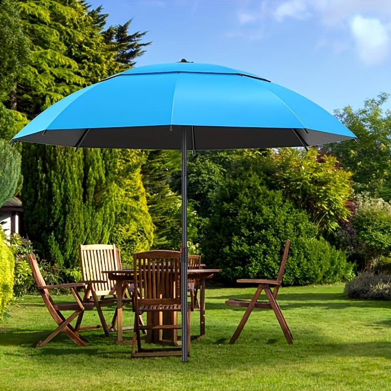 uv protection outdoor sun umbrella lightweight and foldable with manual open close mechanism fiberglass frame blue polyester canopy suitable for camping beach fishing and picnics stylish patio accessory durable outdoor gear