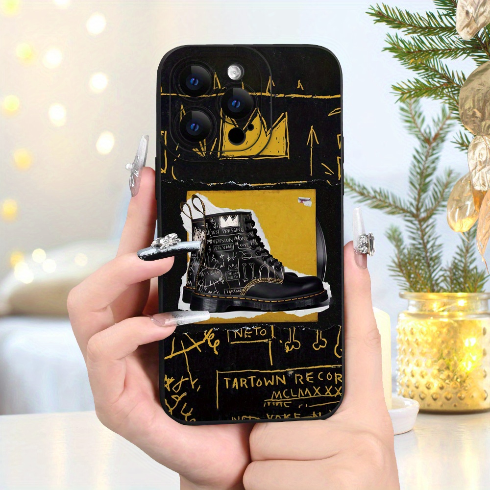 black and gold phones shoes