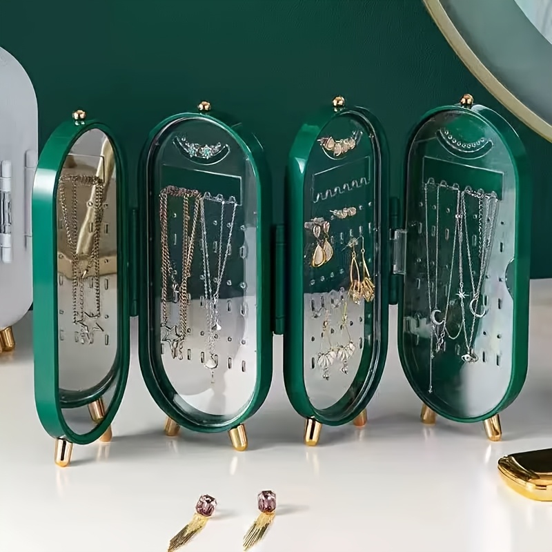 a foldable jewelry storage box with a   featuring a large capacity earring and necklace holder with   designed as an attractive display case for dressing tables it   a foldable earring clip jewelry organizer Product details 1
