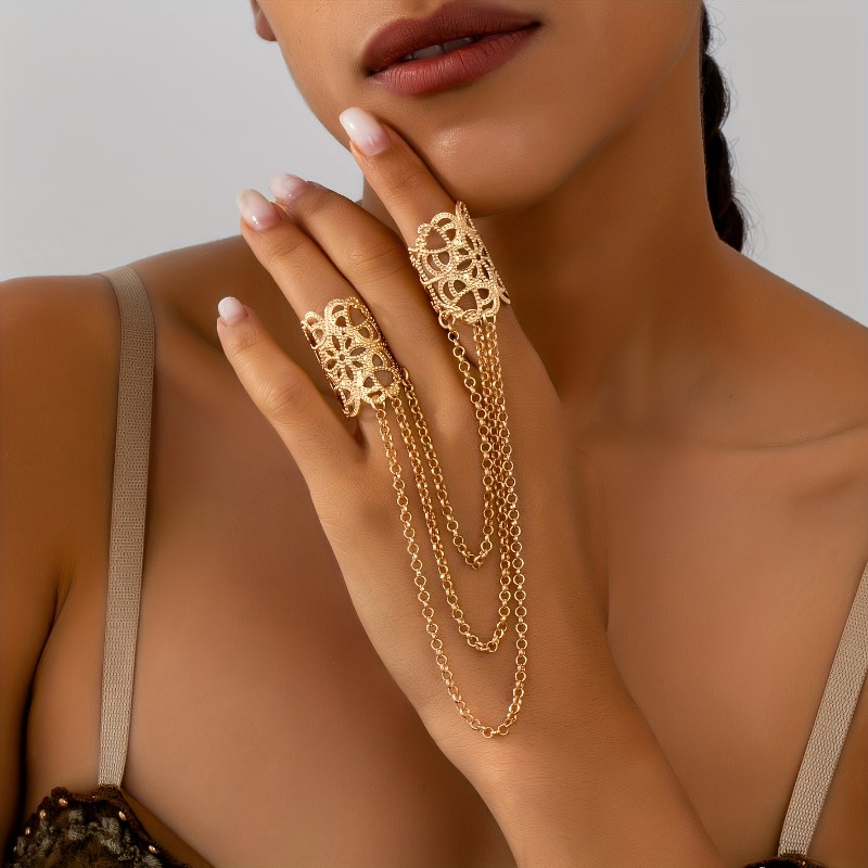 an elegant three tiered tassel design with intricate cutout patterns a luxurious and fashionable womens ring in metallic   for banquets or as gift  