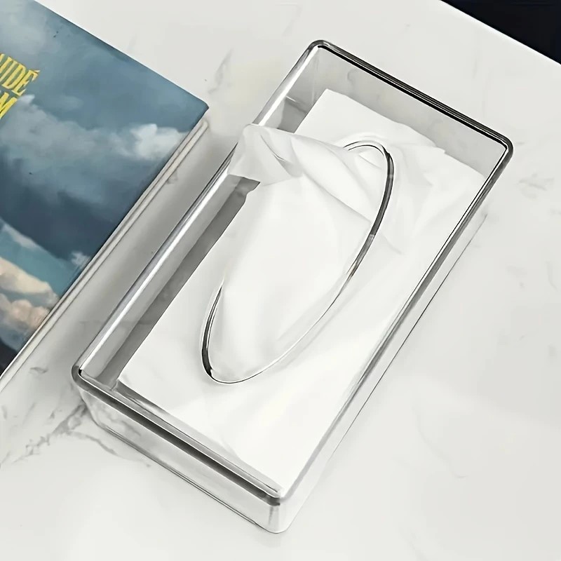 a modern transparent acrylic tissue box cover with a  , featuring a smooth tissue outlet, suitable for decorating bath  and living  . Product details 5